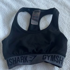 Gymshark dry moisture management sports bra. Size xs. Colors are grey and black